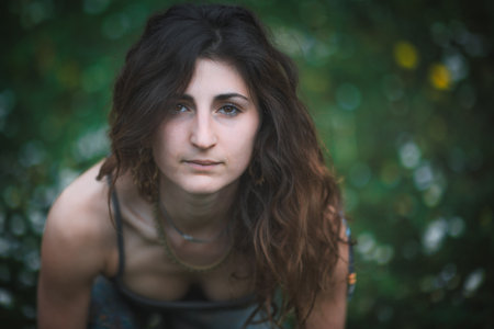 Portrait of young Caucasian woman in nature