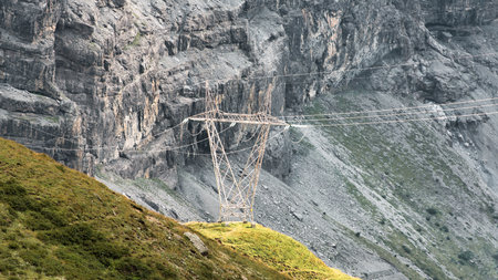 High-tension passage in a high mountain pylon in the Italian Alps