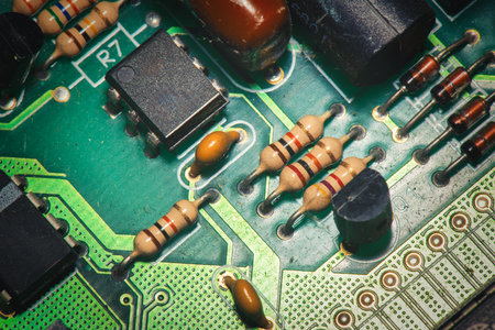 Close-up of printed circuit with electronic resistors