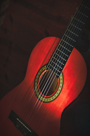 Classic guitar on neutral backgroundの写真素材