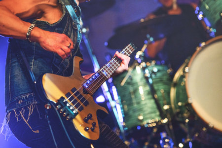 Five string electric bass in a live band
