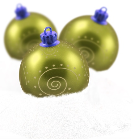 decorated gold christmas ball isolated on whiteの写真素材
