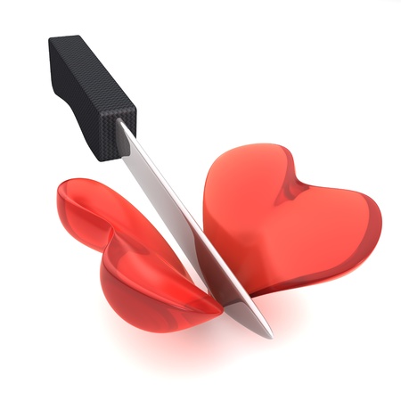 3d image of a knife cutting an heart isolated on white backgroundの写真素材