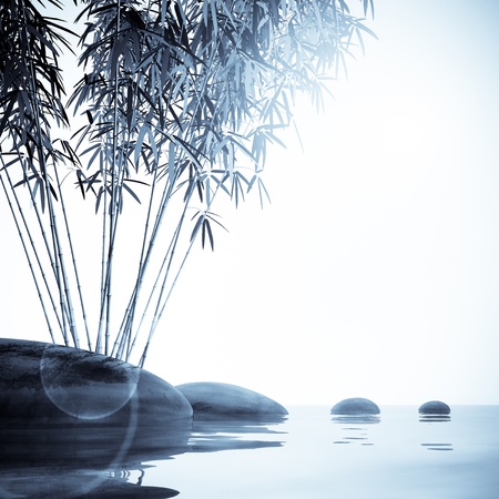 Bamboo and stones on the waterの写真素材