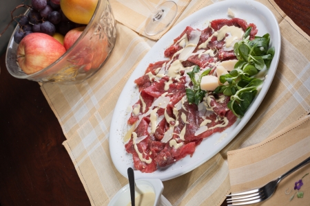 carpaccio with rucola, parmesan cheese and mayonnaise sauceの写真素材