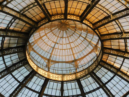 The iron-and-glass dome of the Galleria Vittorio Emanuele II in Milan, Italy's oldest active shopping mall, designed in 1861 and built by architect Giuseppe Mengoni between 1865 and 1877.のeditorial素材