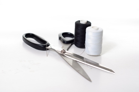 sewing set against white background with colored objectsの写真素材