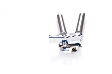 steel can opener against a white backgroundの写真素材