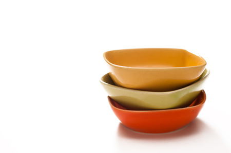 colored saucers on a white backgroundの写真素材