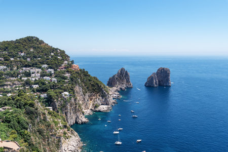 Breathtaking view of the bay of Capri with its famous Faraglioni rocks