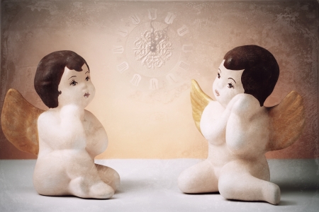 Two guardian angels and the timeの写真素材
