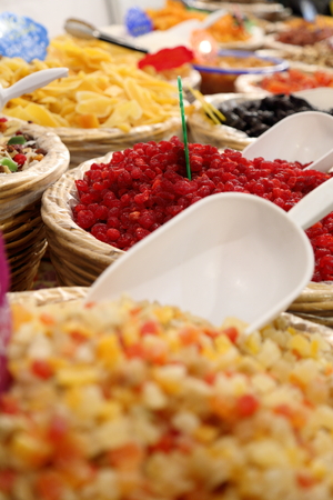 Baskets of spices and dried fruit marketの写真素材