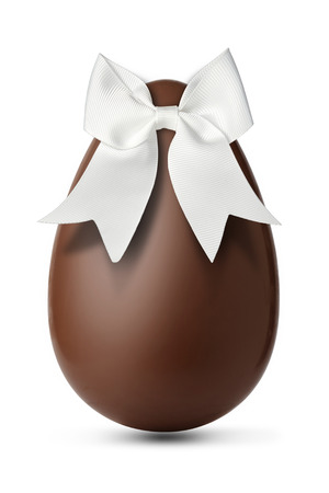 Chocolate egg with a beautiful white ribbonの写真素材