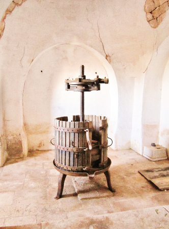 Old wooden grape press in old houseの写真素材