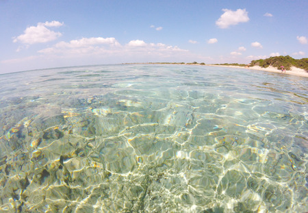 Wonderful beach with crystal clear water in summer in Salento, Puglia, Italyの写真素材
