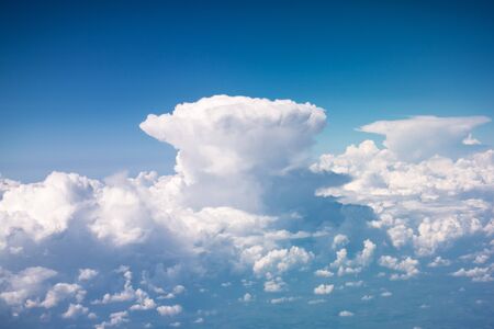 Beautiful giant Cumulonimbus, dense, towering vertical cloud forming from water vapor carrying by...