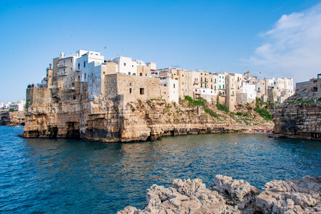 Panoramic cityscape of Polignano a Mare on the rocks, Puglia region, Italy, Europe. Traveling concept background with blue seaのeditorial素材