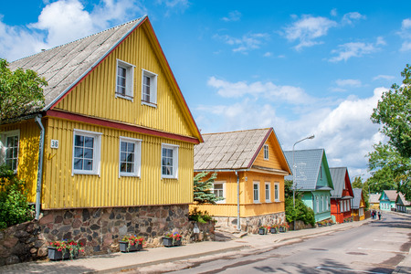 Trakai, Vilnius / Lithuania - July 7 2019: Old Lithuanian traditional wooden houses with three...