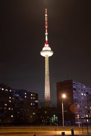 Vilnius panorama with TV Tower and buildings, Lithuania, night, verticalのeditorial素材