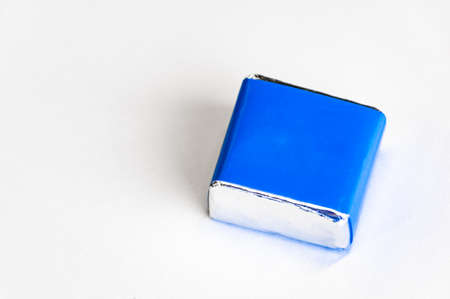 Blue cube on a white background, empty background for text