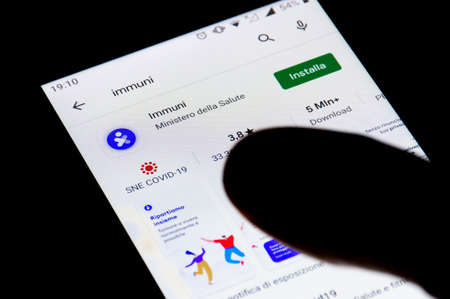 Roma, Italy - October 7 2020: Stop Covid, Immuni App, official COVID-19 or Coronavirus contact tracing app for Italy, Italian Government's exposure notification solution, tracking system, downloadのeditorial素材