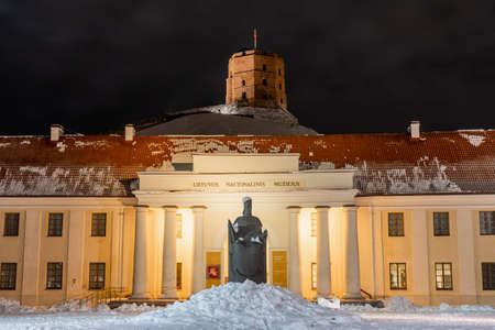 National Museum of Lithuania and Gediminas statue and tower or castle in winter with snowのeditorial素材