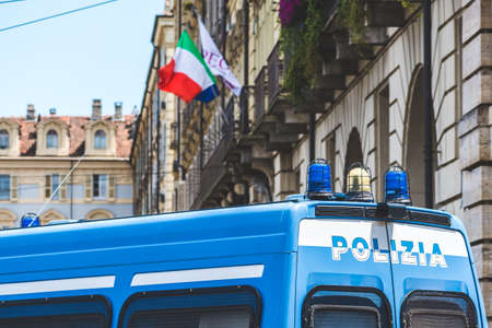 Torino, Italy - July 10 2021: Armored Italian police truck or car in the square during a demonstration in the city with Italian flag on backgroundのeditorial素材