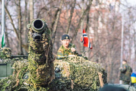 Vilnius, Lithuania - February 16 2022: Norwegian Army armored tank with cannon and camouflage...