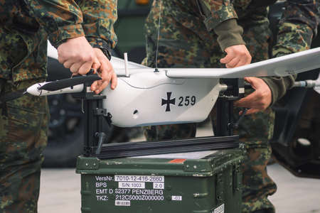 Berlin, Germany - March 29 2022: German Army soldiers preparing a Aladin UAV military portable...