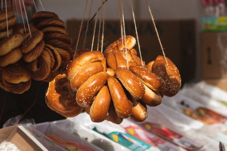Sushki, traditional Russian, also Ukrainian and Lithuanian, Eastern European small, crunchy, mildly sweet bread rings with poppy seeds in a street food regional marketの写真素材