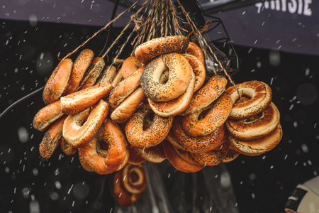 Sushki, traditional Russian, also Ukrainian and Lithuanian, Eastern European small, crunchy, mildly sweet bread rings with poppy seeds in a street food regional marketの写真素材