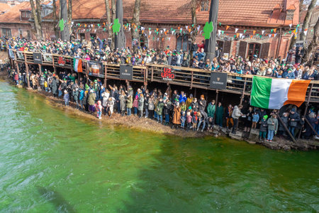 Vilnius, Lithuania - March 18 2023: Irish St. Patrick's Day celebration along the banks of the Vilnele River in Uzupis, Vilnius, Lithuaniaのeditorial素材