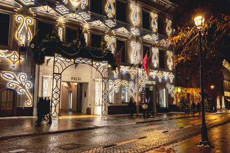 Vilnius, Lithuania - December 5 2023: Beautiful cozy Christmas decorations and lights in the old town of Vilnius, capital of Lithuania, Europe, by nightのeditorial素材