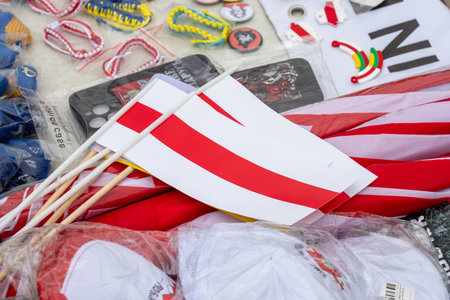 Vilnius, Lithuania - Mat 18 2025: Gadgets for sale during a peaceful protest supporting Belarus against ongoing repressions and call for free with people and red and white flags ofの写真素材