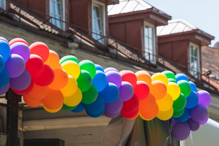 Rainbow colored balloons on a truck during Vilnius Baltic Prideの写真素材