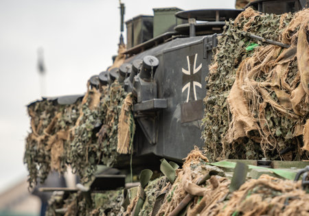 Germany - November 22 2025: Detail of a German Army armored Leopard tank moving on the road with the symbol of the Heerのeditorial素材