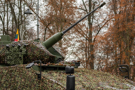 Vilnius, Lithuania - November 22 2025: German light tank Vilkas with a mounted autocannon pointing towards the skyのeditorial素材