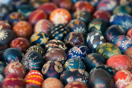 Traditional Lithuanian wooden colorful Easter eggs, symbol of fertility and life painted with the...