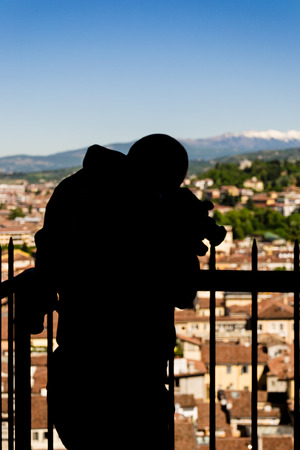 Reflection of a photographerの写真素材