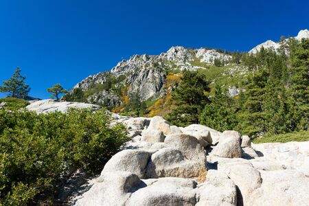 Visitors to Emerald Bay State Park, lake tahoe enjoy hiking the mountains, swimming in the lakes,...