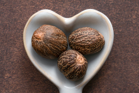 Whole Nutmeg in a Heart Shaped Spoon