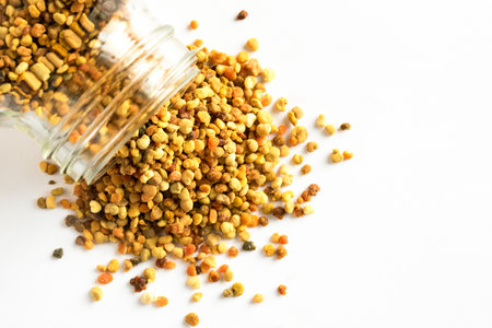 Bee Pollen Spilled from a Jarの写真素材