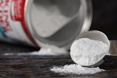 Baking Powder Spilled from a Teaspoonの写真素材