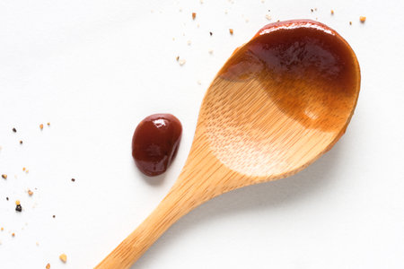 BBQ Sauce on a Wood Spoonの写真素材