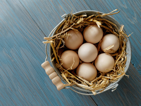Bucket of fresh organic eggs top viewの写真素材