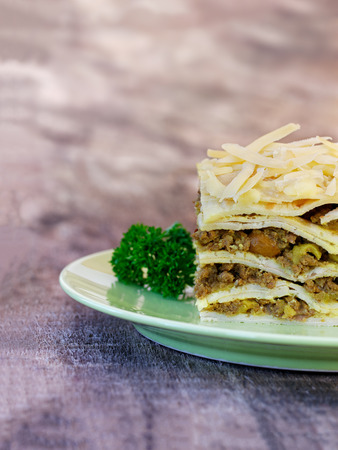 South African bobotie dish layered with pancakesの写真素材