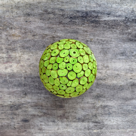 Wooden green wicker ball, eco conceptual の写真素材