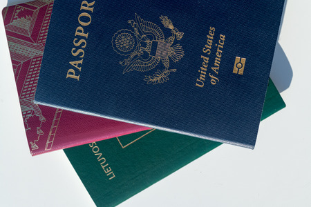 Dark blue US Passport  Alongside EU Style Red and Green Passports