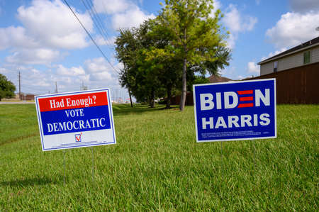 Stafford Texas - September 27, 2020: HAD ENOUGH? VOTE DEMOCRATIC election signs are seen in many residential areas in Texasのeditorial素材