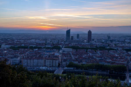Sunrise over the city of Lyon from the FourviÃ¨re hillの写真素材